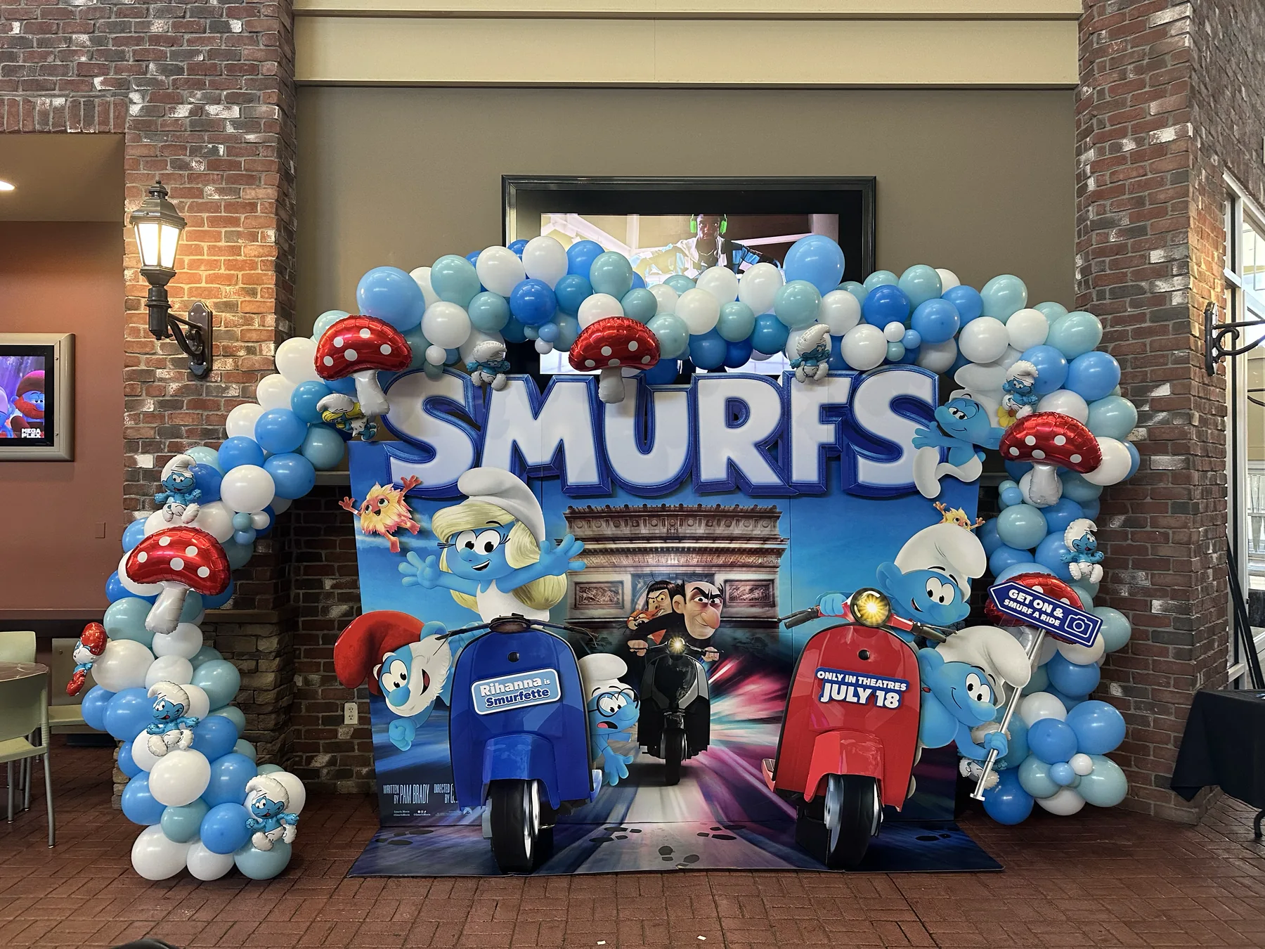 Custom movie-release balloon backdrop for a corporate event